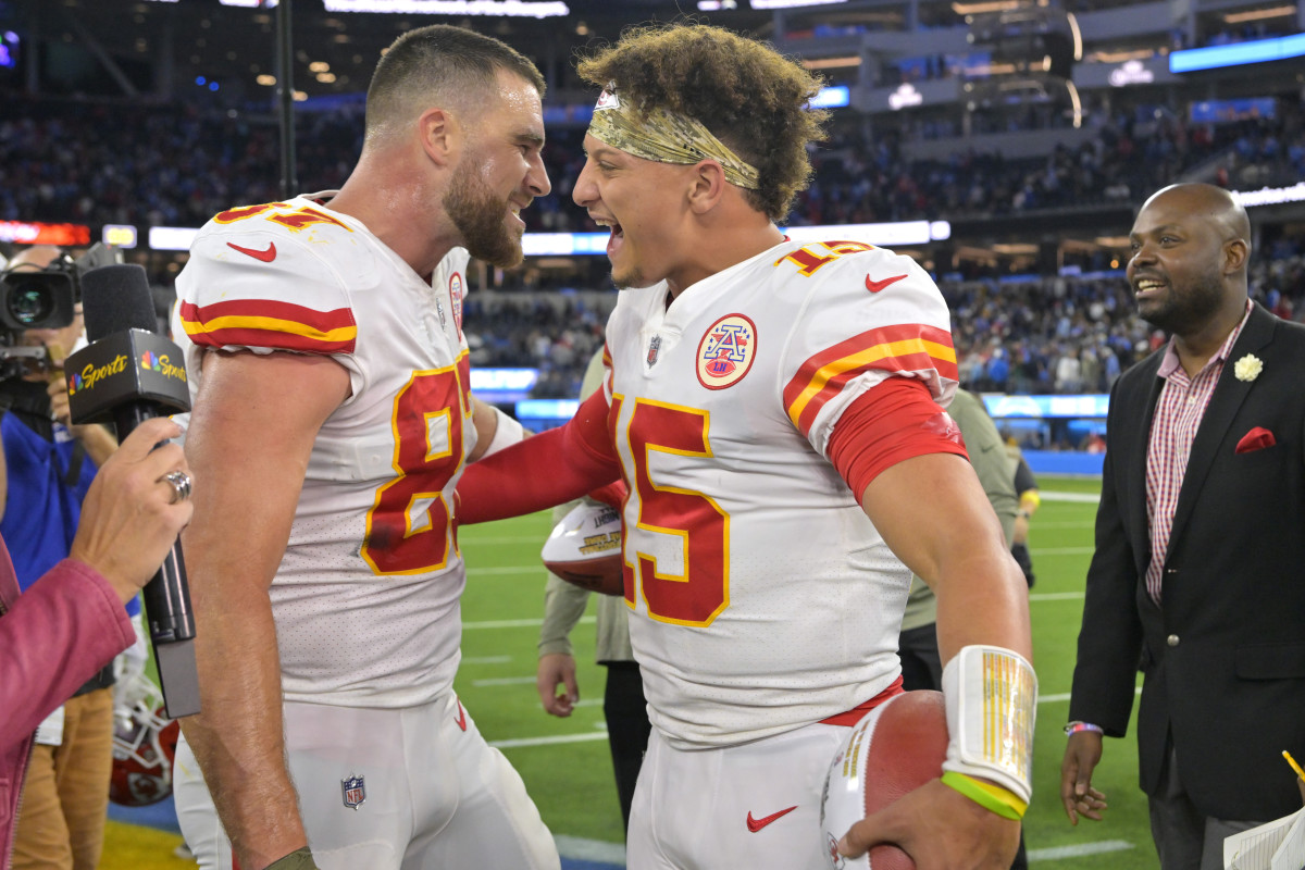Kansas City Chiefs tight end Travis Kelce, left, and quarterback Patrick Mahomes celebrate after the Chiefs defeated the Los Angeles Chargers 30-27 in an NFL football game Sunday, Nov. 20, 2022, in Inglewood, Calif.