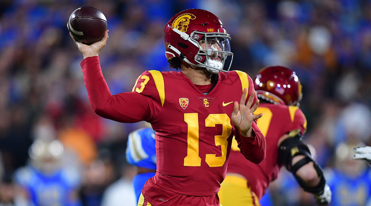 USC QB Caleb Williams goes back to throw a pass against UCLA.