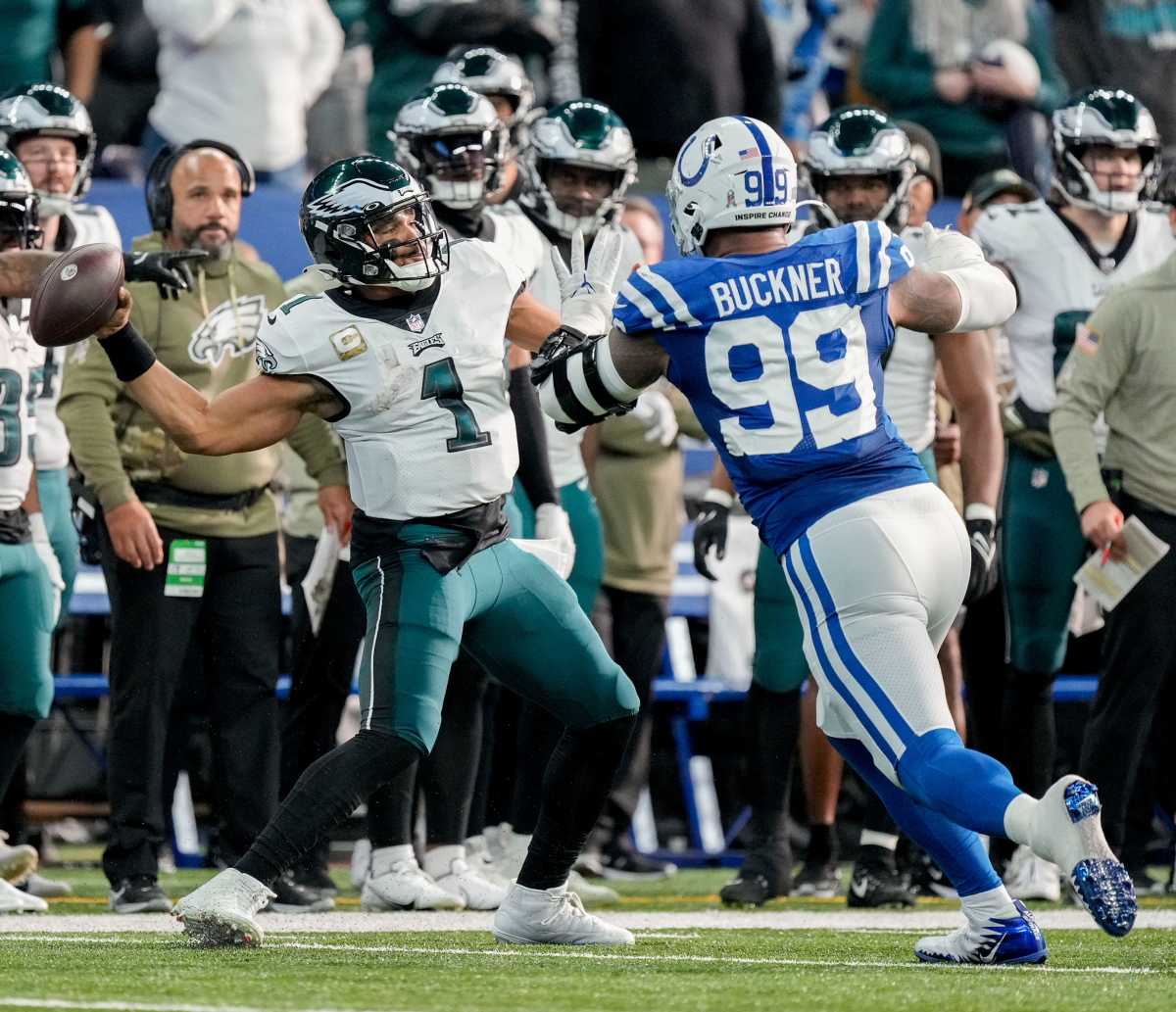 Indianapolis Colts defensive tackle DeForest Buckner (99) pressures Philadelphia Eagles quarterback Jalen Hurts (1) on a fourth down play Sunday, Nov. 20, 2022, during a game against the Philadelphia Eagles at Lucas Oil Stadium in Indianapolis.