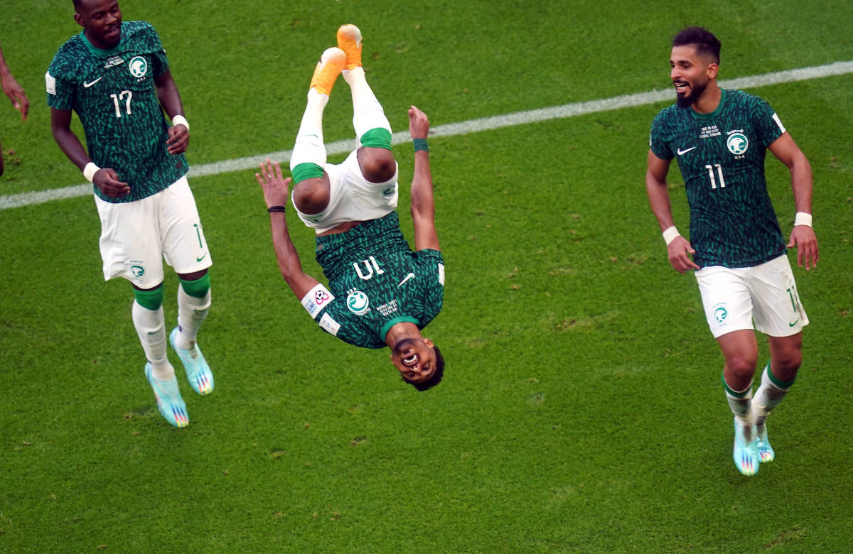 Salem Al-Dawsari pictured celebrating with a somersault after scoring for Saudi Arabia against Argentina at the 2022 FIFA World Cup in Qatar
