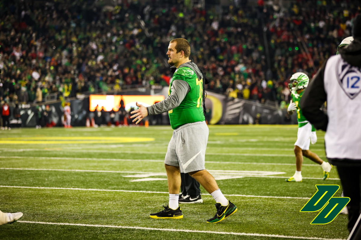 Oregon offensive lineman Alex Forsyth was in full pads for the senior night ceremony but did not play against Utah after being injured last week.