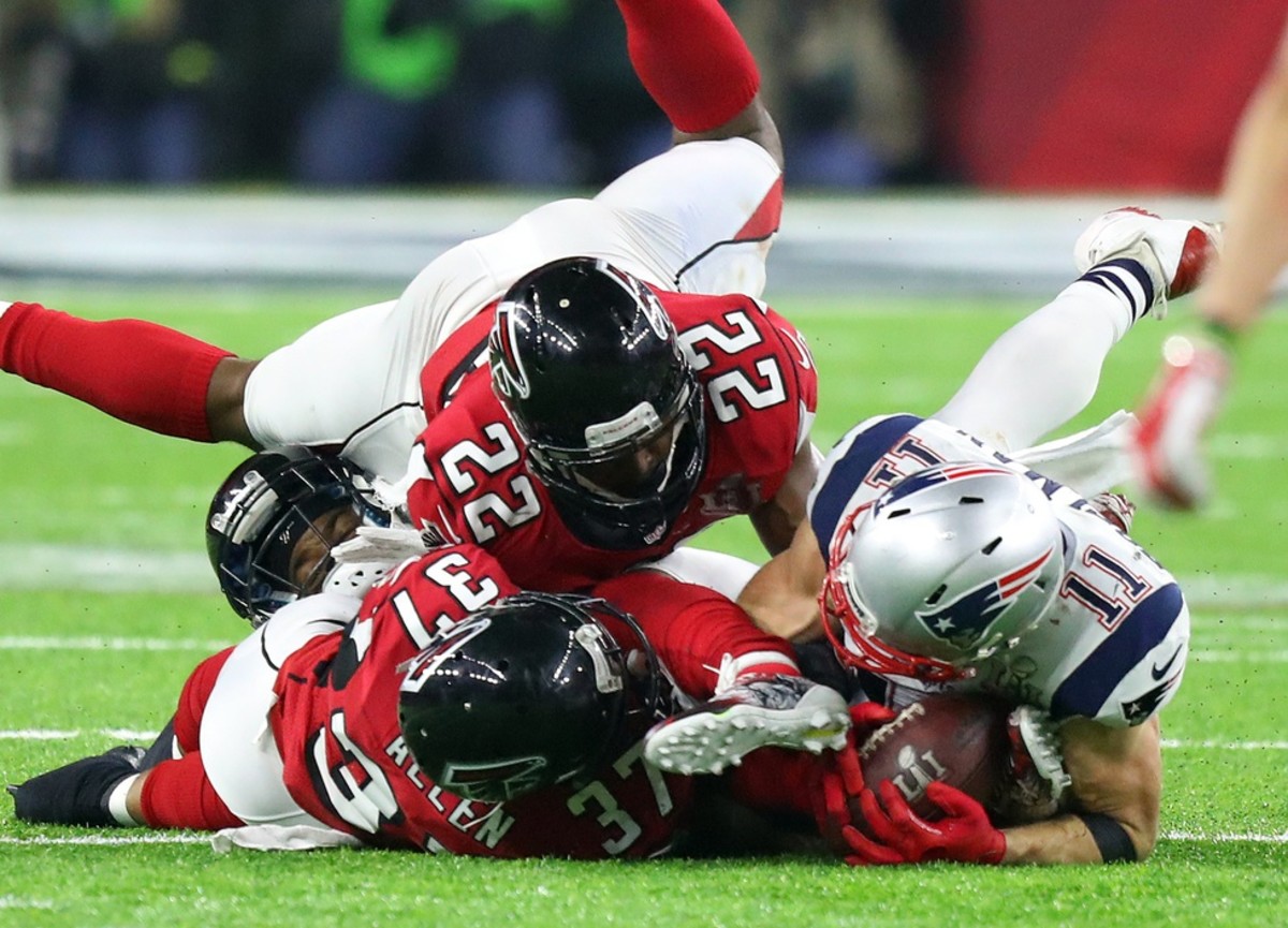 Julian Edelman's catch just before the ball would have touched the turf gave the Patriots a first down and propelled them to another Super Bowl win.