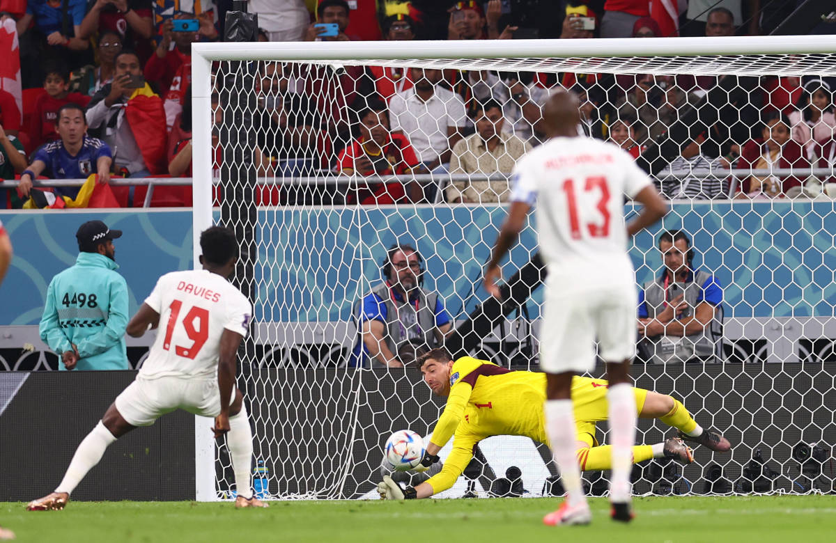 Thibaut Courtois of Belgium pictured saving a penalty from Canada's Alphonso Davies at the 2022 FIFA World Cup in Qatar