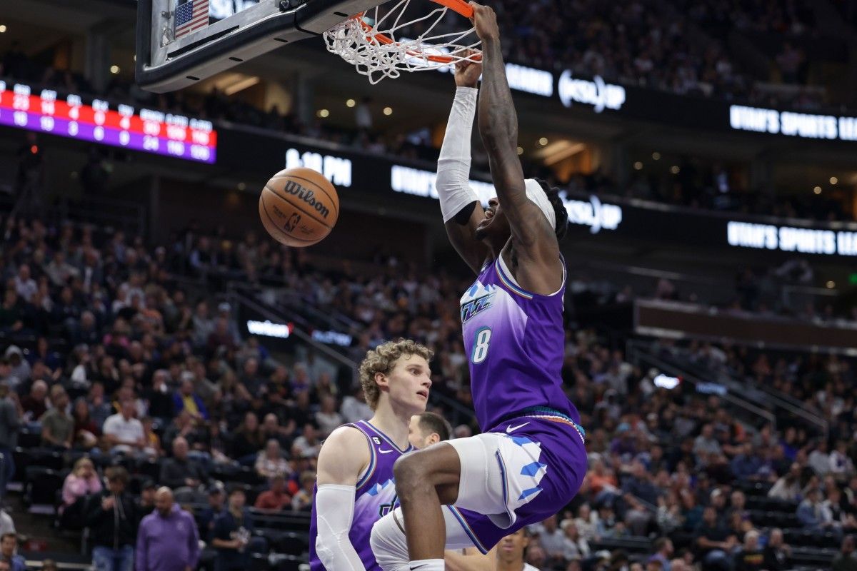 Utah Jazz forward Jarred Vanderbilt (8) dunks the basketball during the second half against the Detroit Pistons at Vivint Arena.