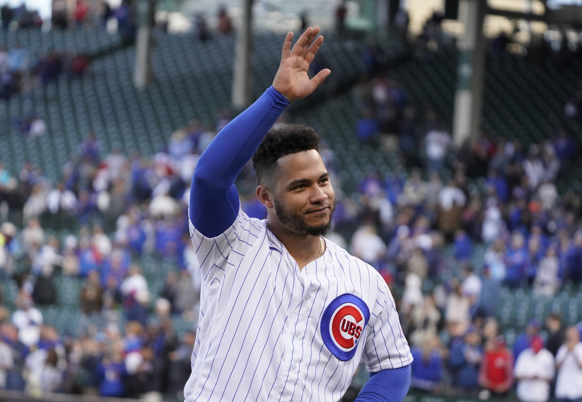 Cubs catcher Willson Contreras waves to fans after a game against the Reds. (2022)