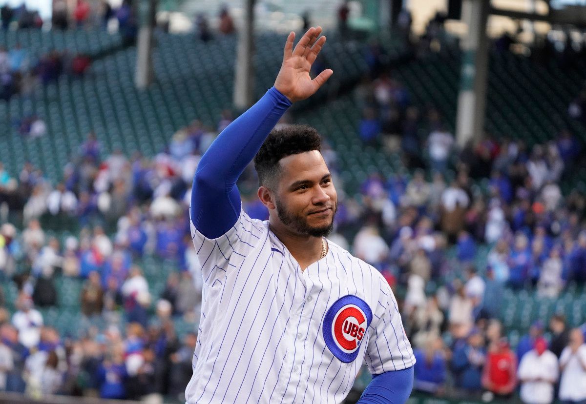 Cubs catcher Willson Contreras waves to fans after a game against the Reds. (2022)