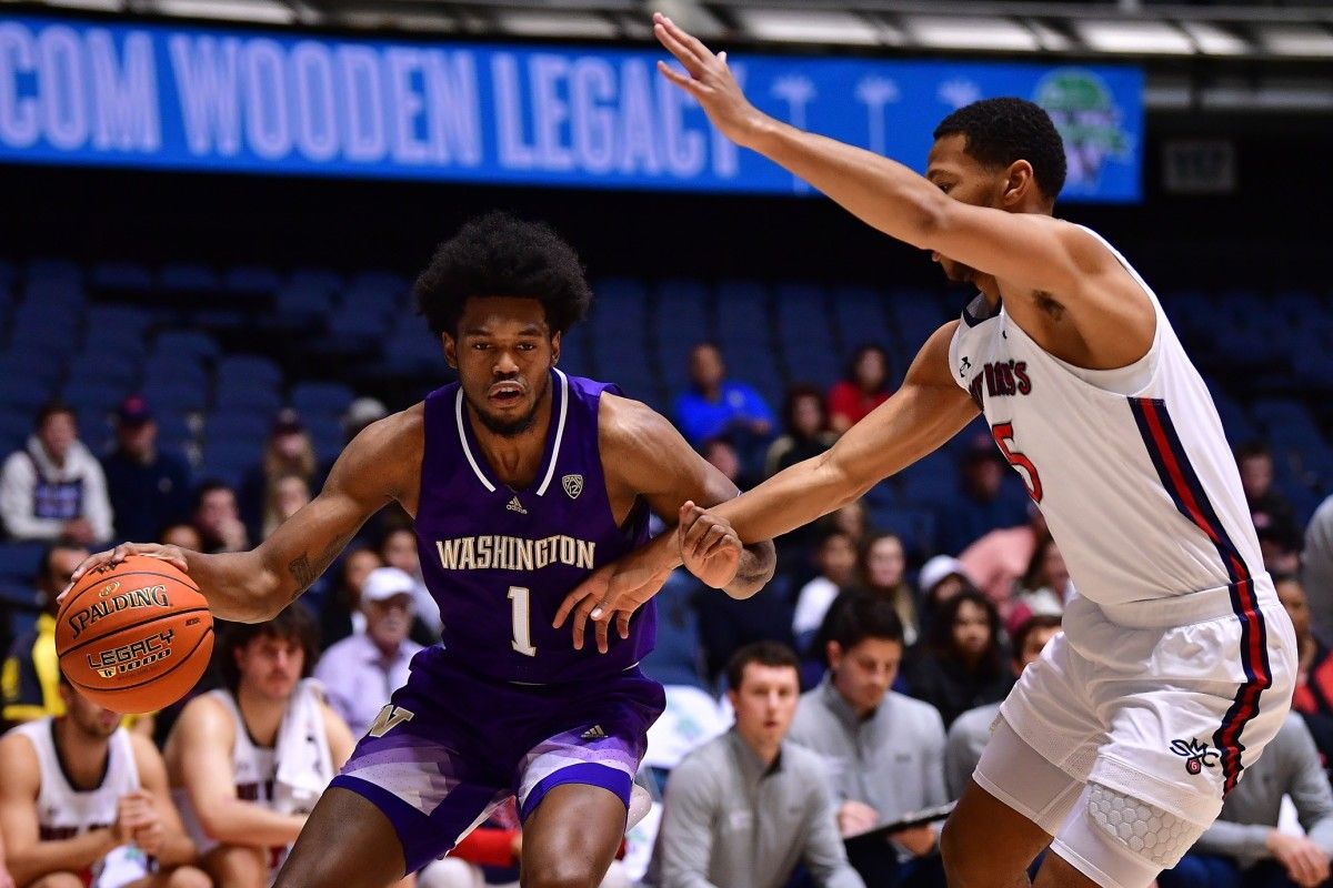 Keion Brooks looks for room to maneuver against St. Mary's in the Wooden Legacy title game.