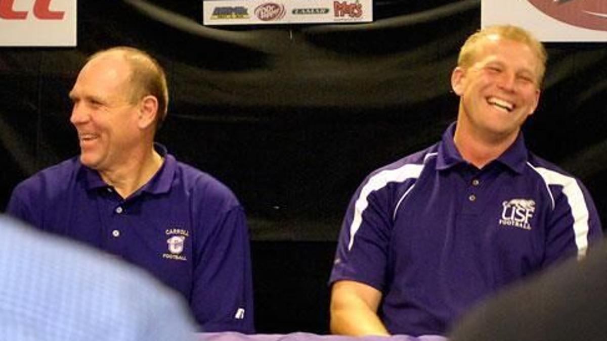Van Diest and DeBoer share a laugh at the American Football Coaches Association convention