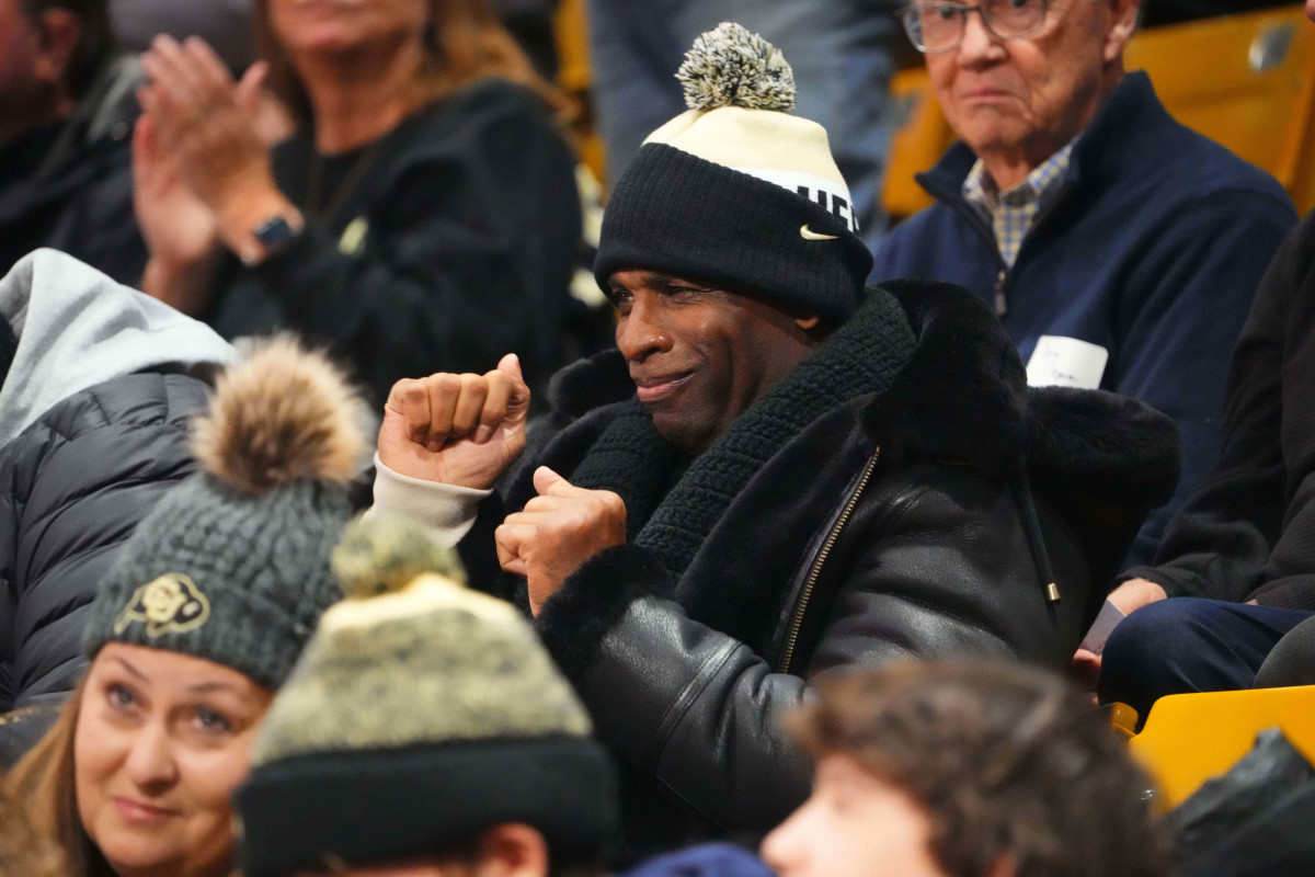 Jan 13, 2024; Boulder, Colorado, USA; Colorado Buffaloes football head coach Deion Sander dances in the first half of the game against the USC Trojans at the CU Events Center