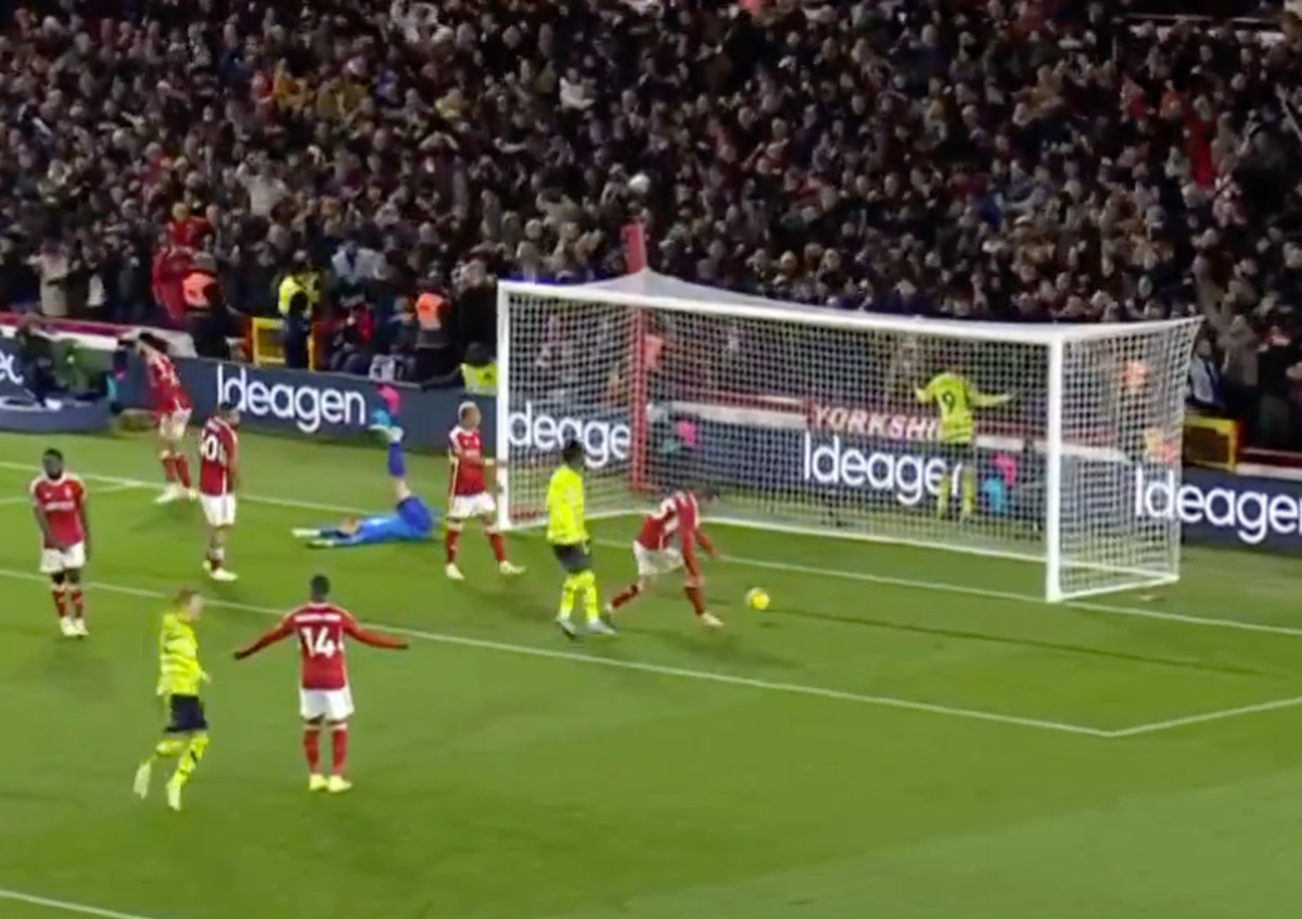 Nottingham Forest keeper Matt Turner pictured lying on his back moments after conceding a goal to Arsenal striker Gabriel Jesus (no.9) in a Premier League game in January 2024