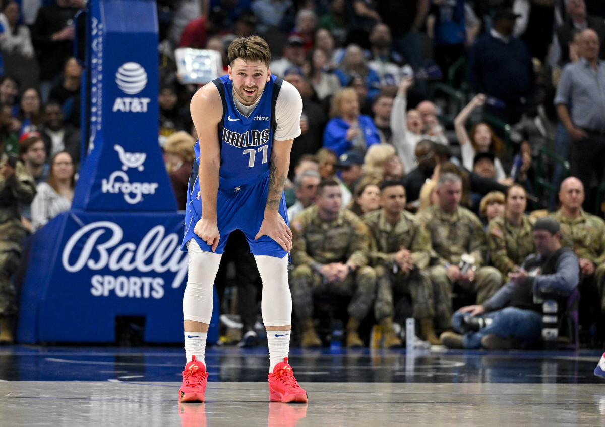 Jan 29, 2024; Dallas, Texas, USA; Dallas Mavericks guard Luka Doncic (77) waits for play to resume against the Orlando Magic during the second half at the American Airlines Center.