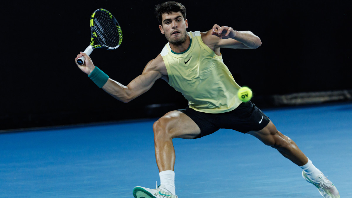 Carlos Alcaraz in action against Alexander Zverev at the Australian Open.