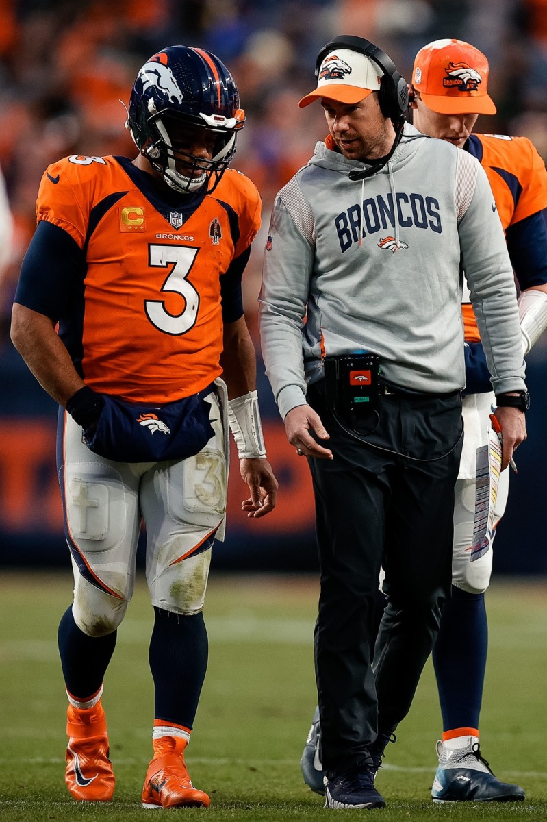 Jan 8, 2023; Denver Broncos quarterback Russell Wilson (3) talks with quarterbacks coach Klint Kubiak. Mandatory Credit: Isaiah J. Downing-USA TODAY