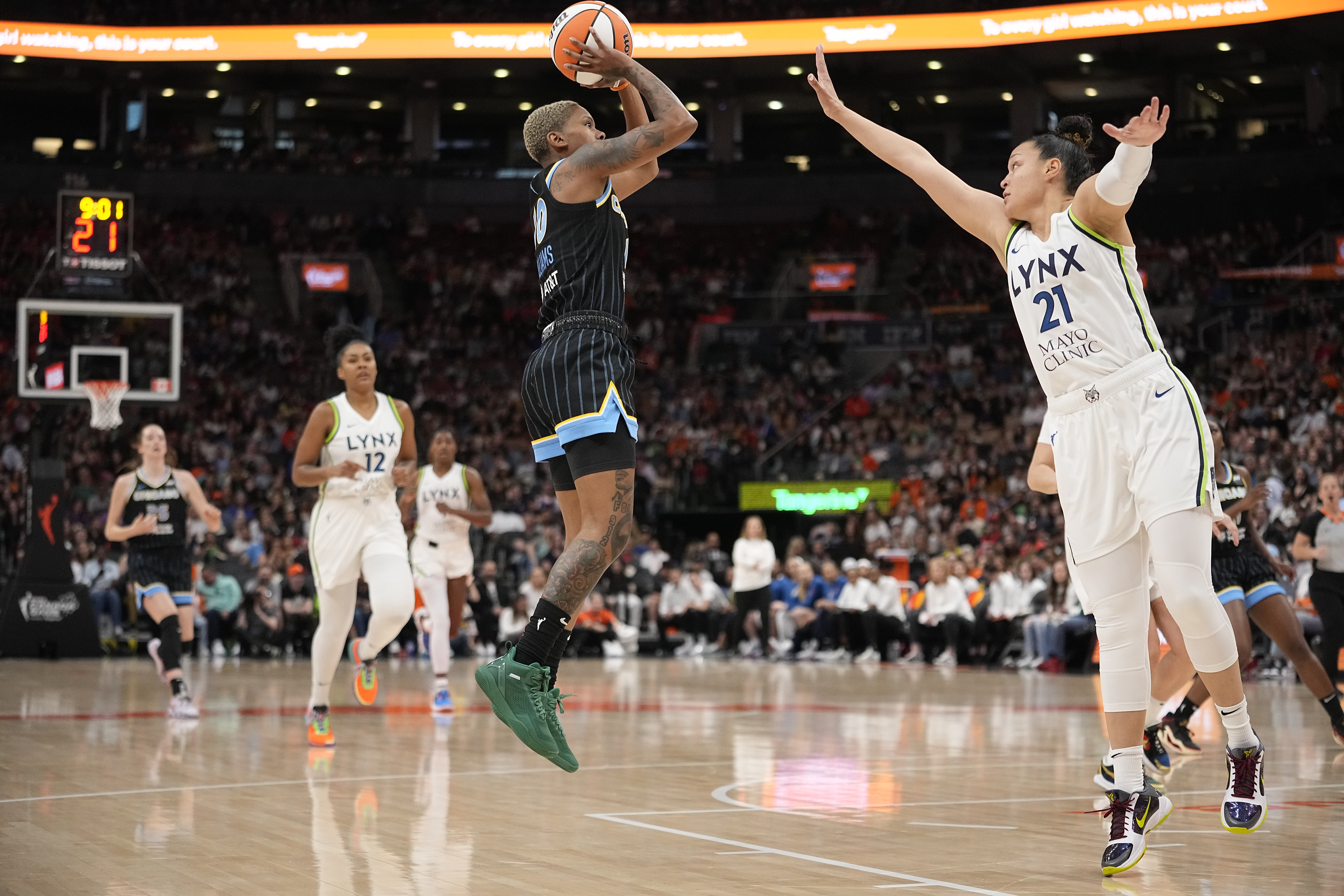 May 13, 2023; Toronto, Ontario, Canada; Minnesota Lynx guard Kayla McBride (21) goes to block a shot by Chicago Sky guard Courtney Williams (10) during the first half at Scotiabank Arena.