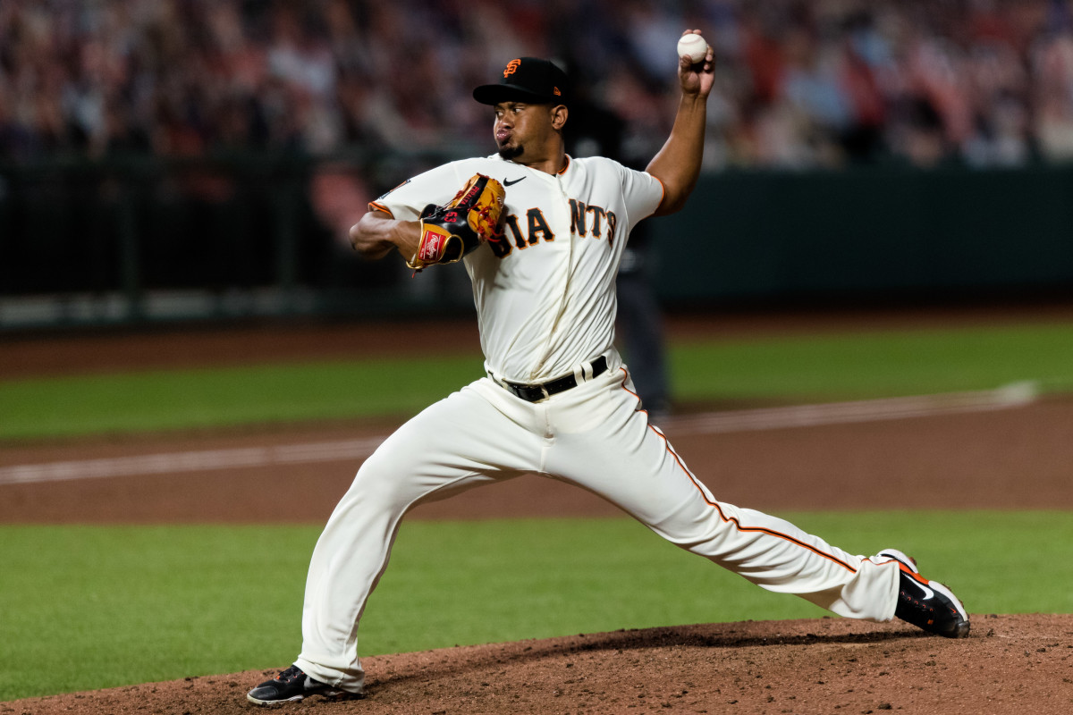 SF Giants relief pitcher Wandy Peralta throws against the Colorado Rockies in the sixth inning at Oracle Park. (2020)