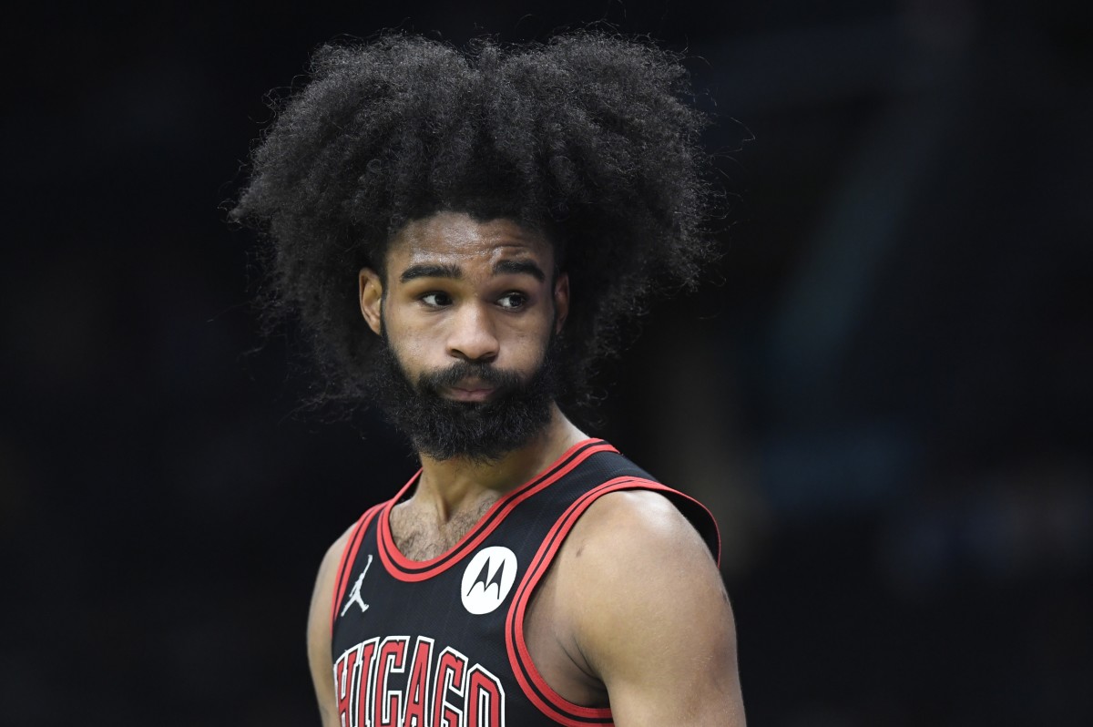 Chicago Bulls guard Coby White (0) in a time out during the second half against the Charlotte Hornets at the Spectrum Center.