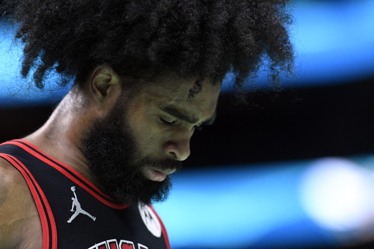 Chicago Bulls guard Coby White (0) reflects during a time out during the second half against the Charlotte Hornets at the Spectrum Center