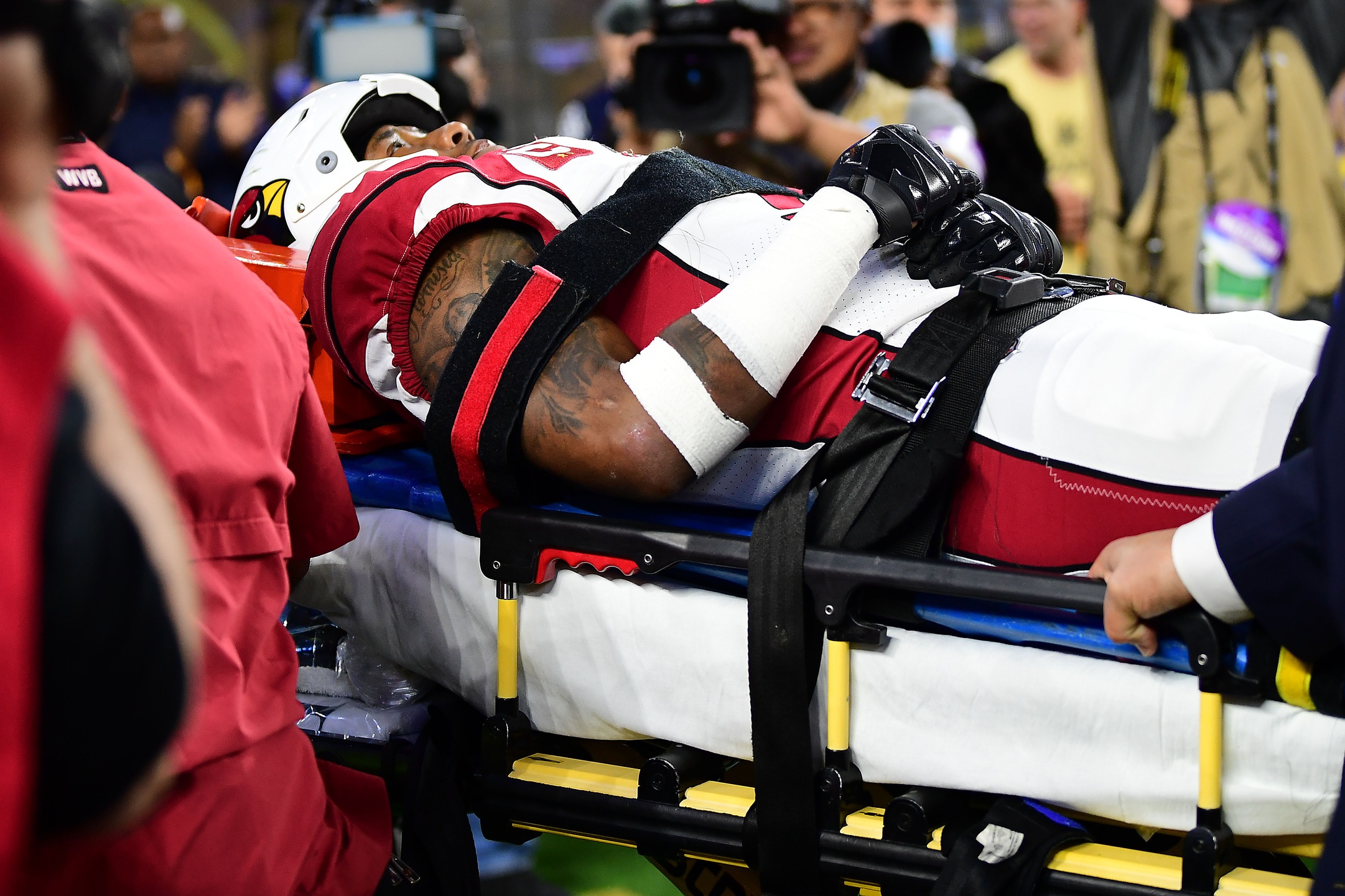 Jan 17, 2022; Inglewood, California, USA; Arizona Cardinals safety Budda Baker (3) is carried on a stretcher after suffering an injury against the Los Angeles Rams during the second half in the NFC Wild Card playoff football game at SoFi Stadium.