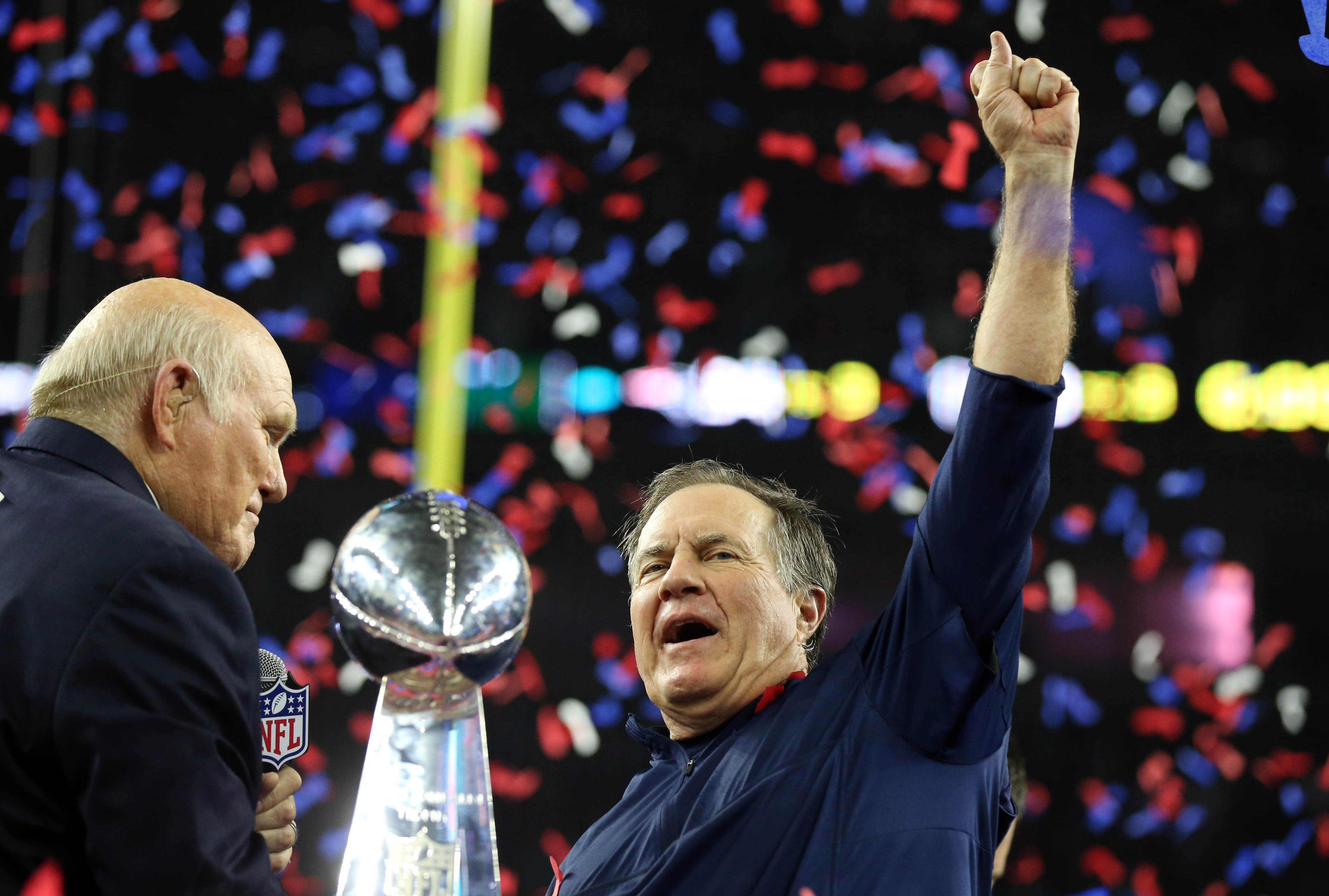 Feb 5, 2017; Houston, TX, USA; New England Patriots head coach Bill Belichick celebrates with the Vince Lombardi Trophy after beating the Atlanta Falcons during Super Bowl LI at NRG Stadium.