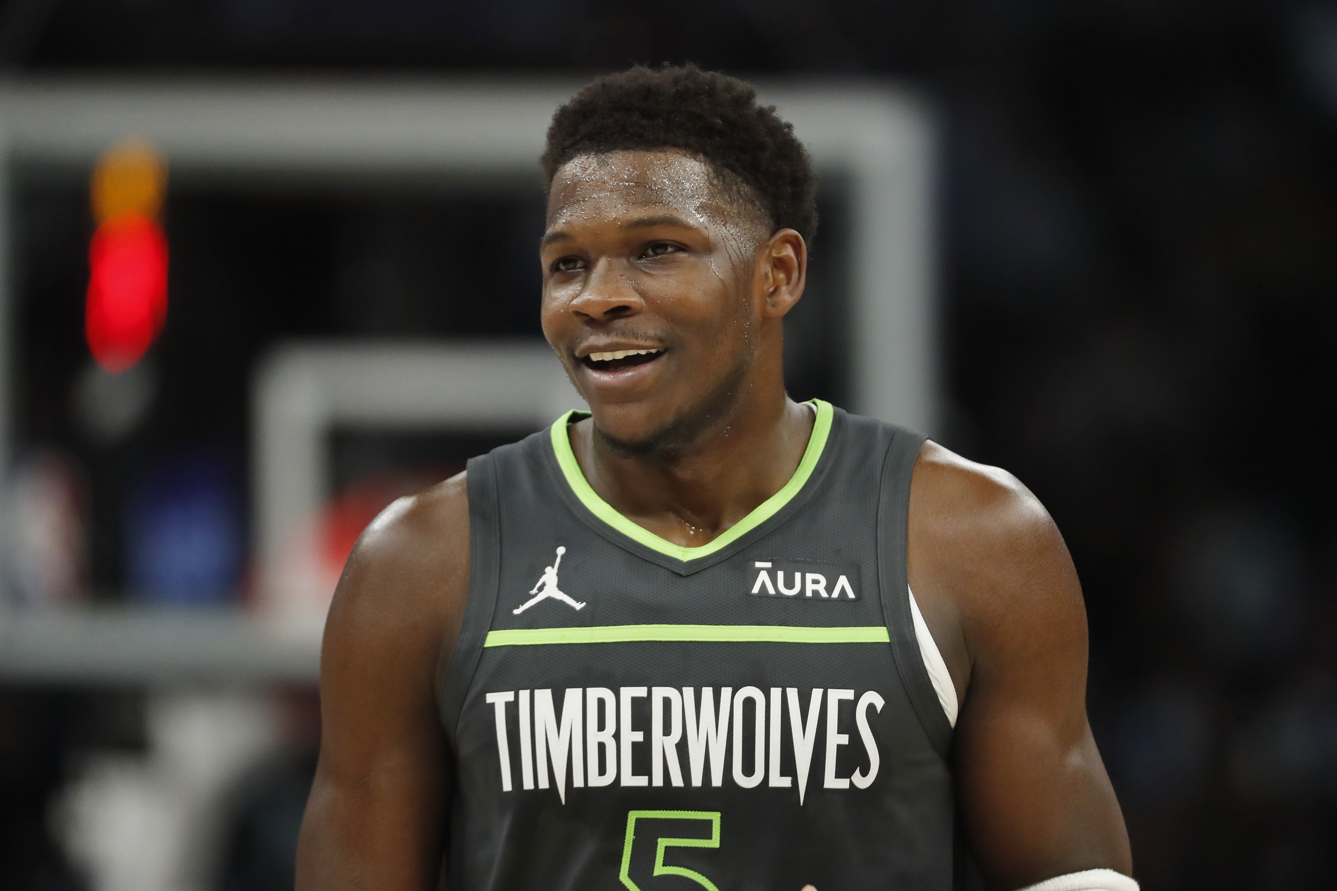 Jan 31, 2024; Minneapolis, Minnesota, USA; Minnesota Timberwolves guard Anthony Edwards (5) laughs after getting called for a foul in the first quarter of the game with the Dallas Mavericks at Target Center.