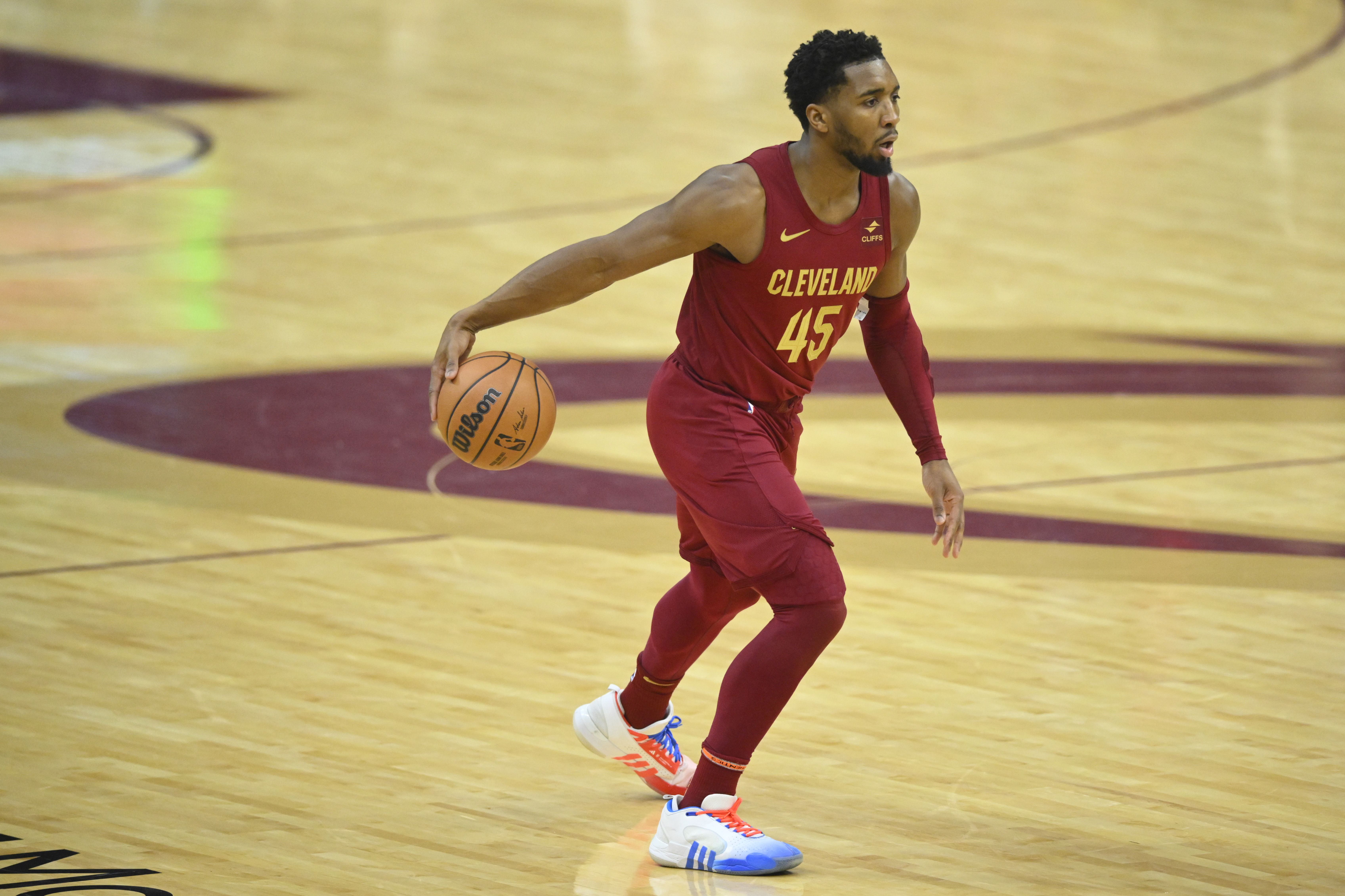 Jan 7, 2024; Cleveland, Ohio, USA; Cleveland Cavaliers guard Donovan Mitchell (45) dribbles the ball in the first quarter against the San Antonio Spurs at Rocket Mortgage FieldHouse.