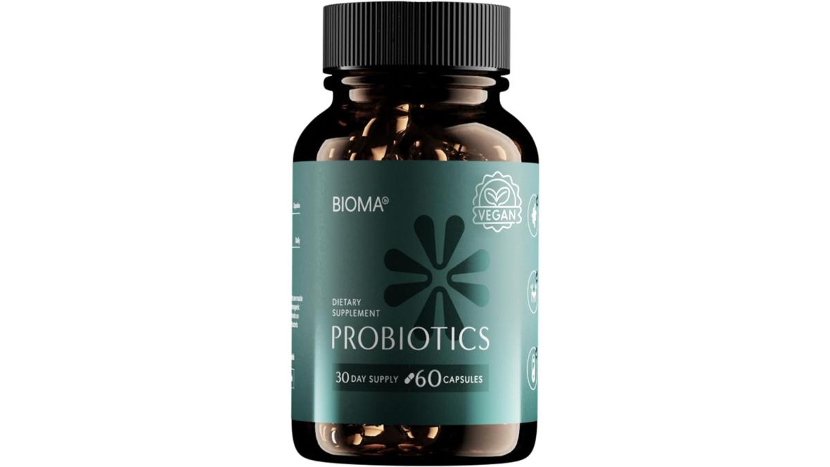 A brown and dark green bottle of Bioma Probiotics against a white background.