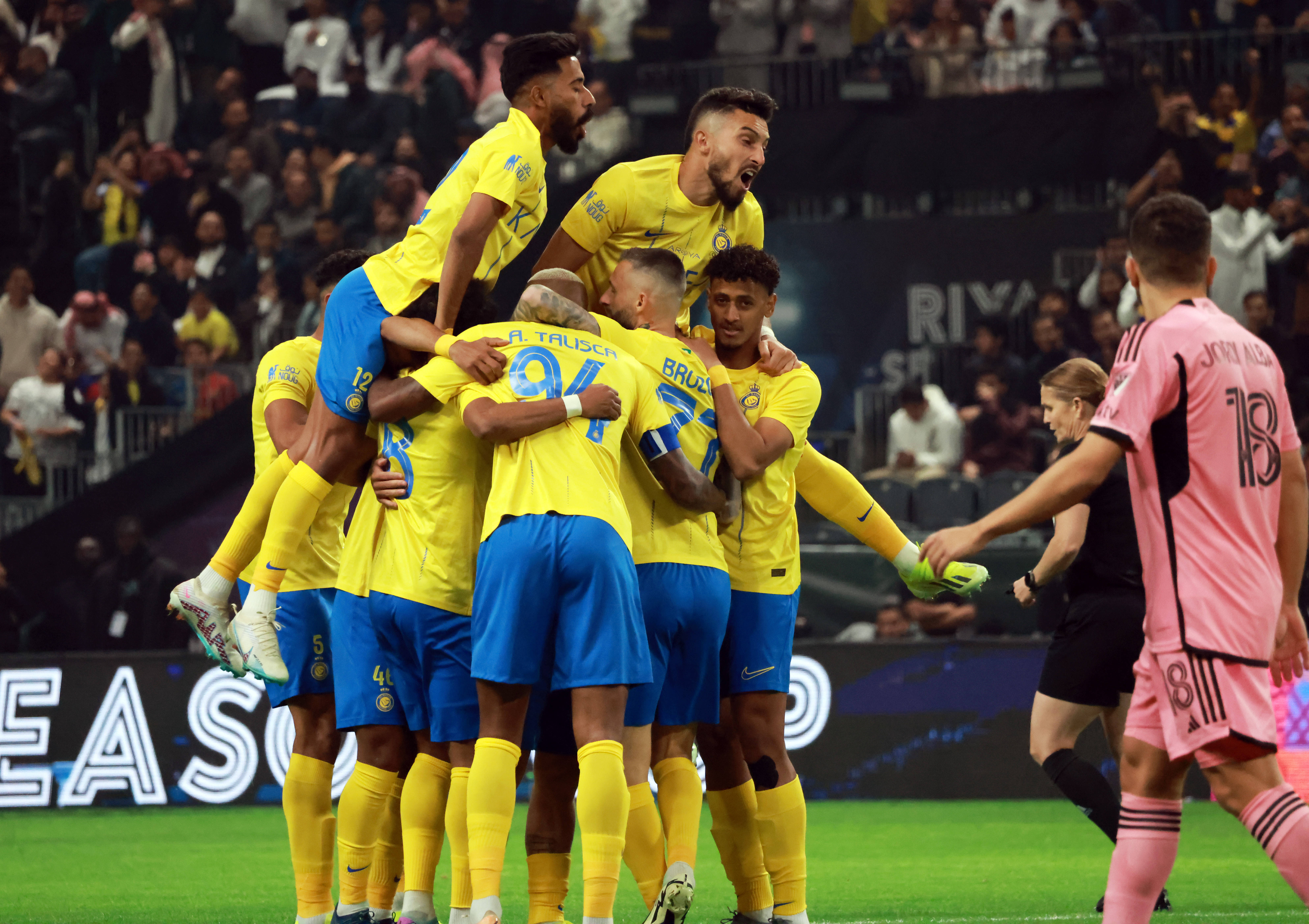 Al Nassr's players pictured celebrating a goal during a 6-0 win over Inter Miami in Saudi Arabia in February 2024