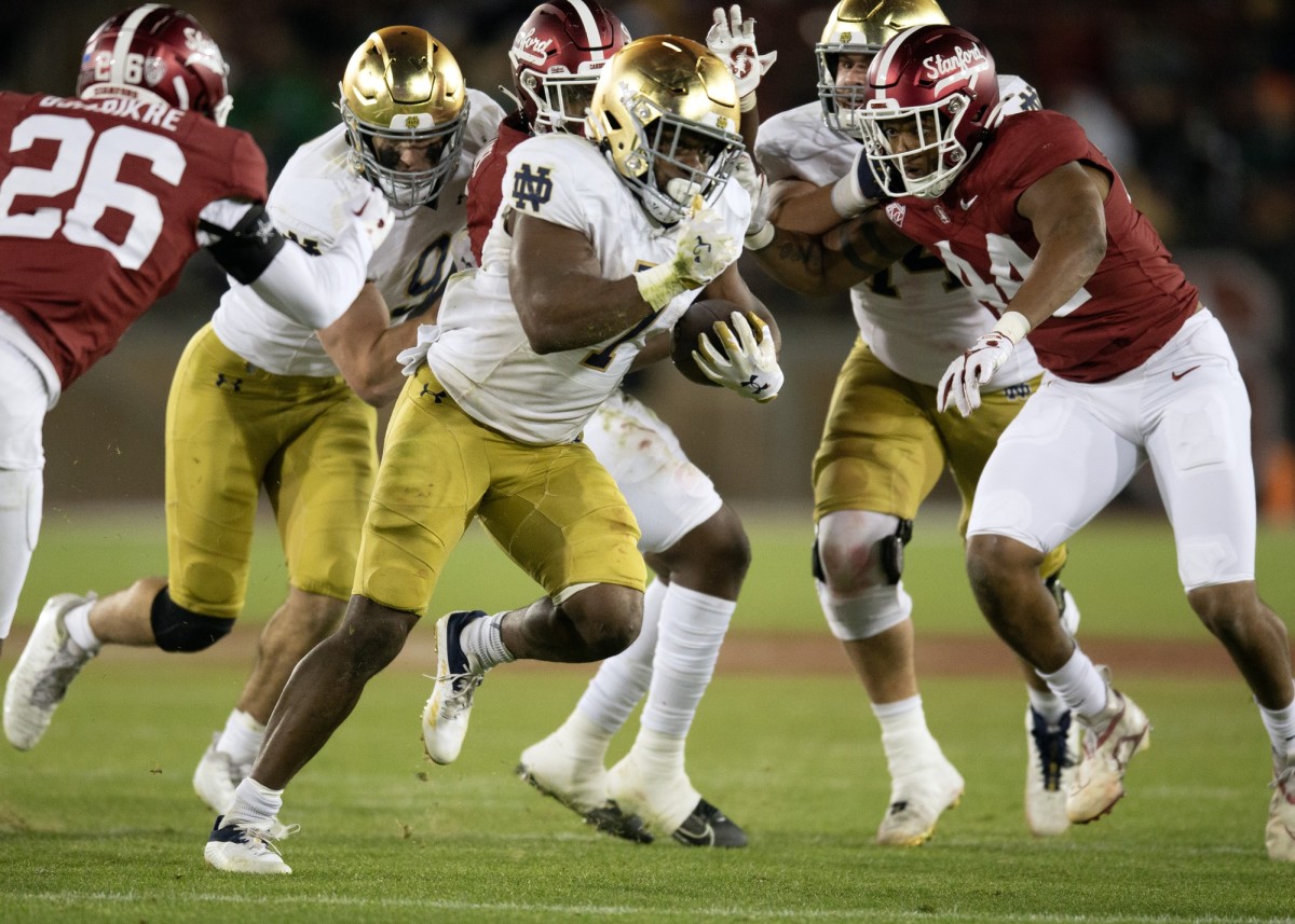 Nov 25, 2023; Stanford, California, USA; Notre Dame Fighting Irish running back Audric Estim (7) breaks free for another touchdown run against the Stanford Cardinal during the third quarter at Stanford Stadium. Mandatory Credit: D. Ross Cameron-USA TODAY Sports  