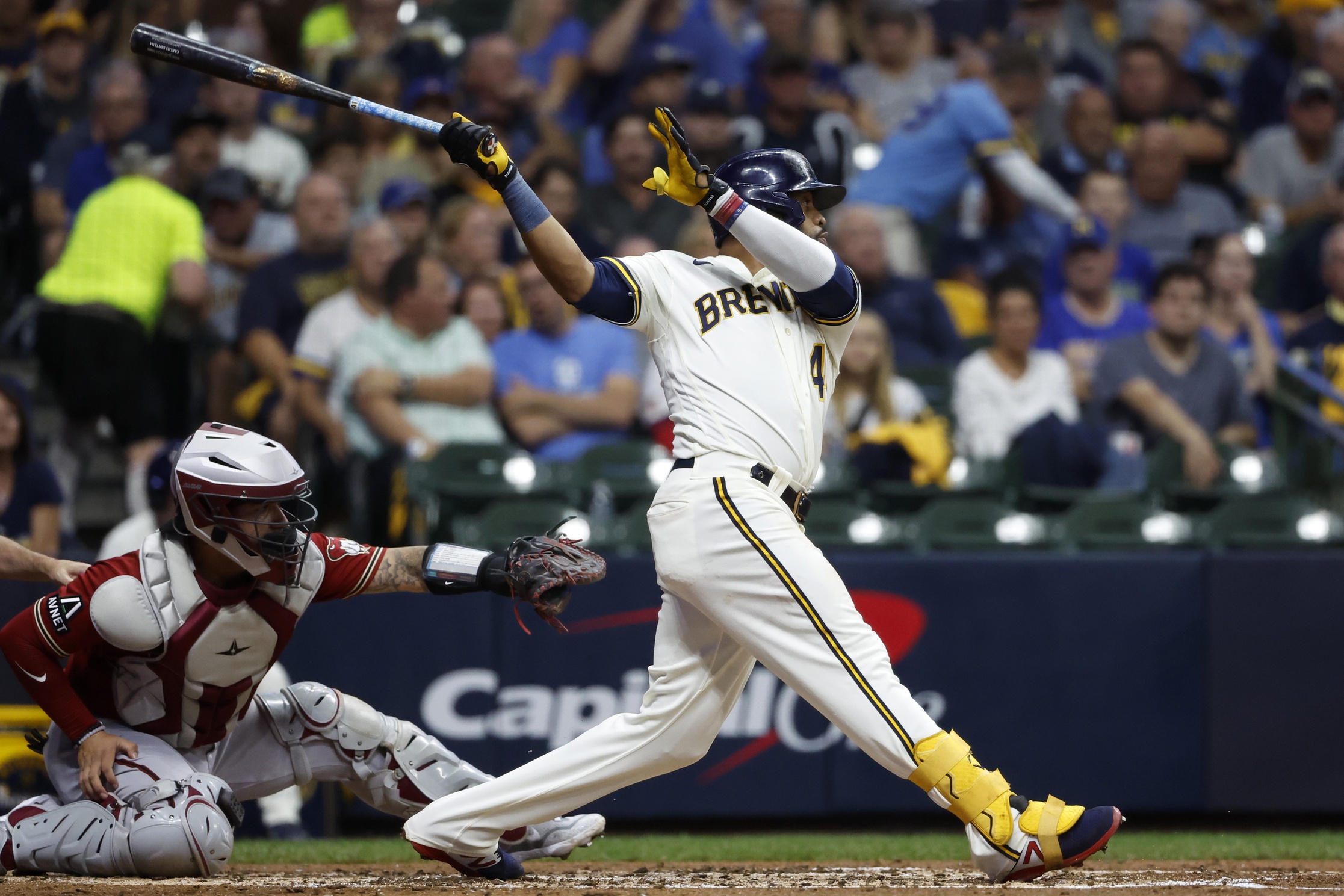 Oct 4, 2023; Milwaukee, Wisconsin, USA; Milwaukee Brewers first baseman Carlos Santana (41) hits a single in the third inning against the Arizona Diamondbacks during game two of the Wildcard series for the 2023 MLB playoffs at American Family Field.