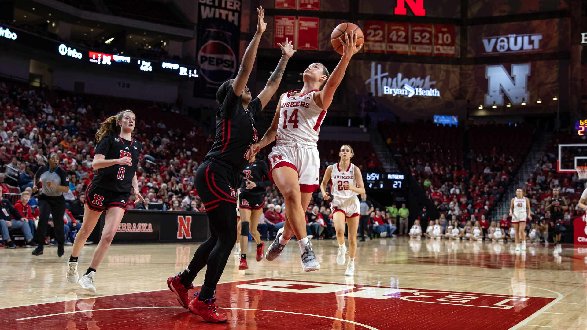 Nebraska sophomore guard Callin Hake scores on a layup after making a steal during the second quarter against Rutgers.