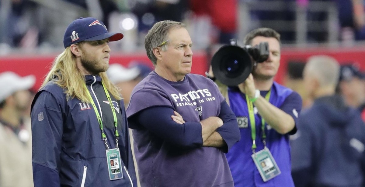 Steve and Bill Belichick share the sideline on game day.