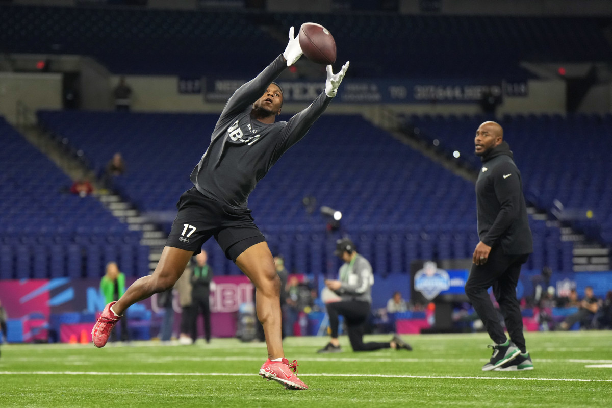 Nic Jones reaches to catch the ball at the 2023 NFL combine