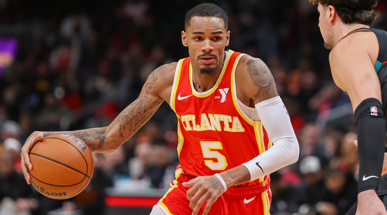 Atlanta Hawks guard Dejounte Murray drives to the basket against the Washington Wizards in the second quarter at State Farm Arena in Atlanta, on Jan 13, 2024.