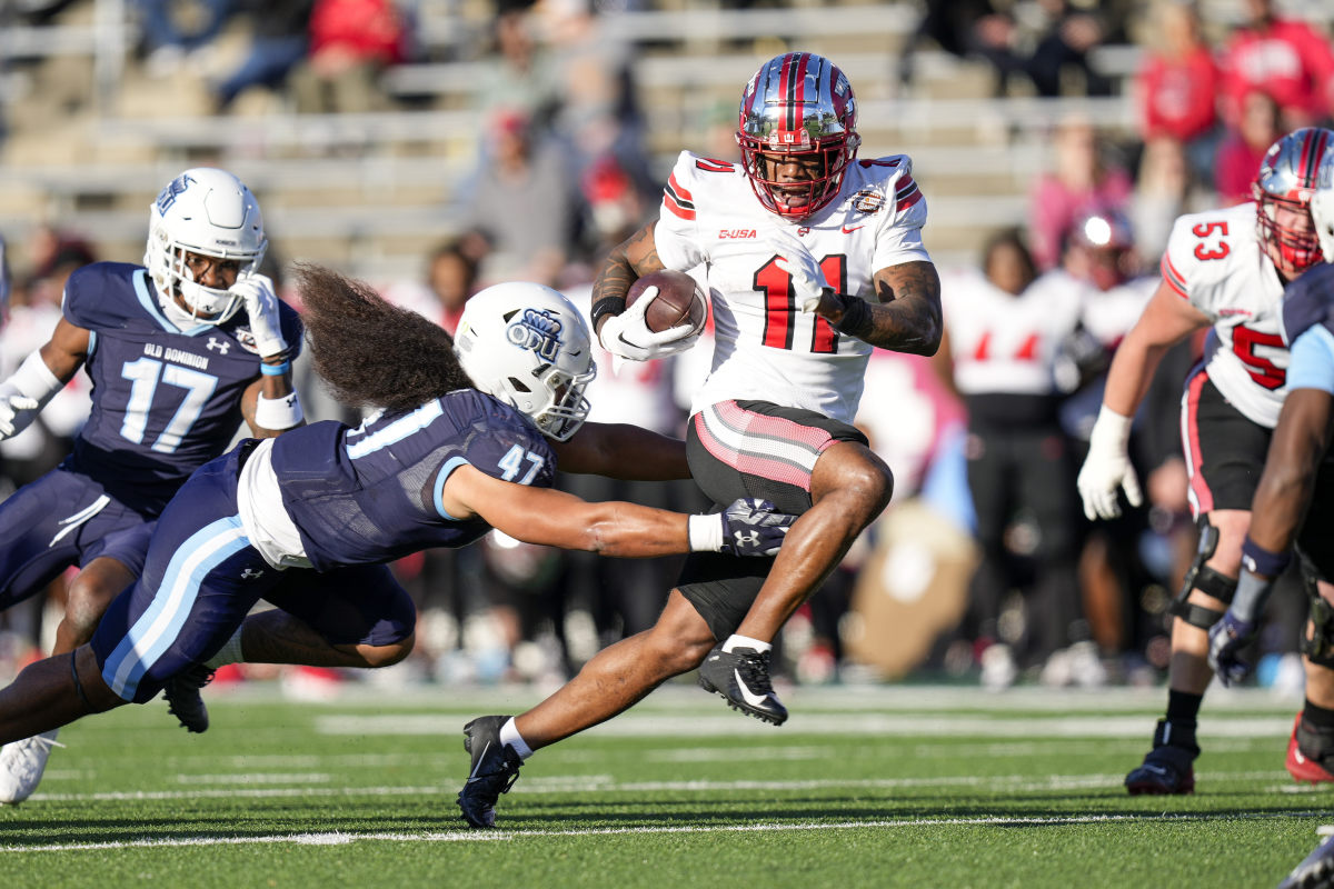 Western Kentucky Hilltoppers wide receiver Malachi Corley (11) runs the ball against Old Dominion.