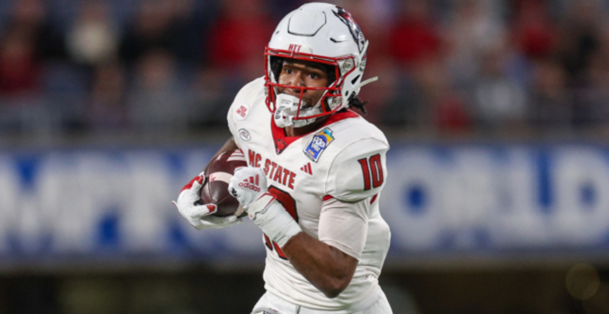 NC State Wolfpack wide receiver KC Concepcion catches a pass during a college football game in the ACC.