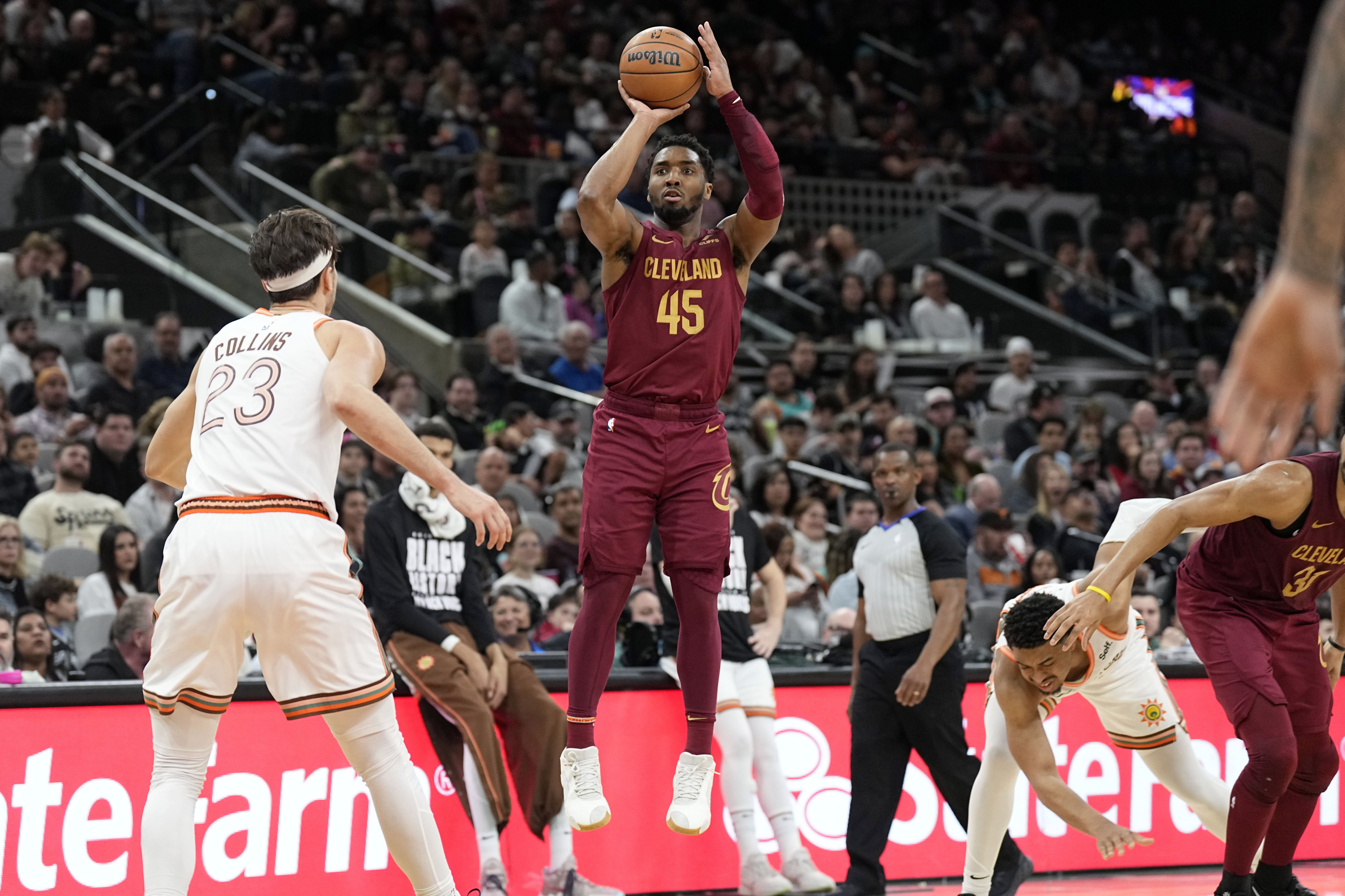 Feb 3, 2024; San Antonio, Texas, USA; Cleveland Cavaliers guard Donovan Mitchell (45) shoots during the second half against the San Antonio Spurs at Frost Bank Center.