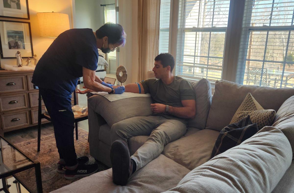 Pete receiving at-home blood test