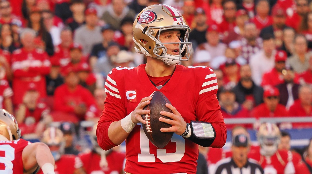 San Francisco 49ers quarterback Brock Purdy (13) looks to pass the ball against the Detroit Lions during the first half of the NFC Championship.