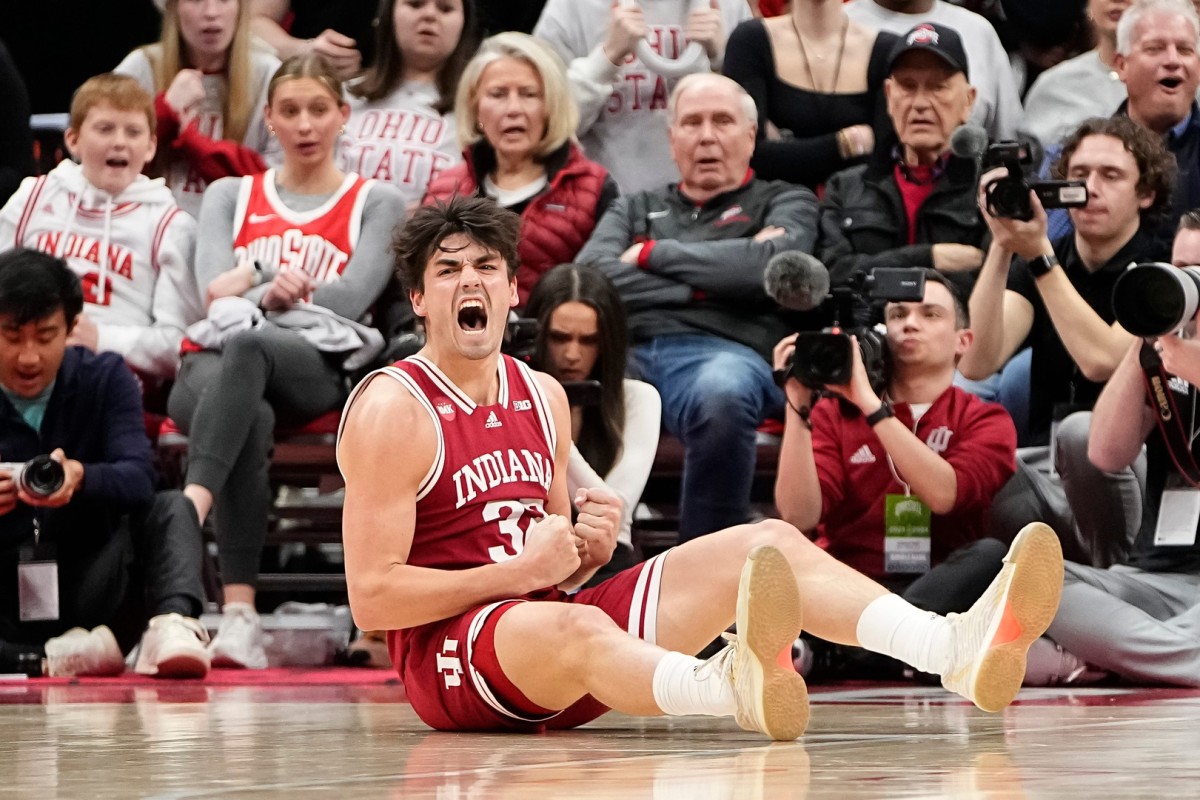 Indiana Hoosiers guard Trey Galloway (32) reacts after drawing a foul during the second half of the men's basketball game against the Ohio State Buckeyes at Value City Arena.
