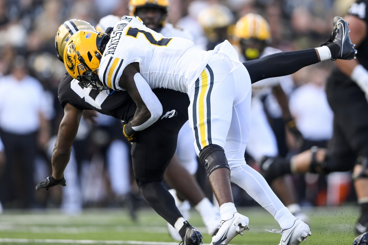 Sep 30, 2023; Nashville, Tennessee, USA; Missouri Tigers defensive back Ennis Rakestraw Jr. (2) tackles Vanderbilt Commodores tight end Justin Ball (84) after a made catch during the first half at FirstBank Stadium. Mandatory Credit: Steve Roberts-USA TODAY Sports  