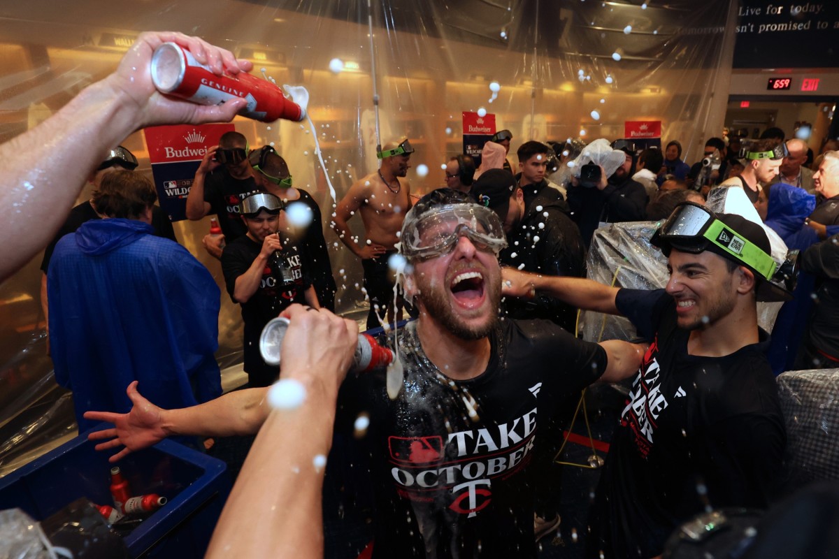 Oct 4, 2023; Minneapolis, Minnesota, USA; Minnesota Twins players celebrate after defeating the Toronto Blue Jays during game two of the Wildcard series for the 2023 MLB playoffs at Target Field.