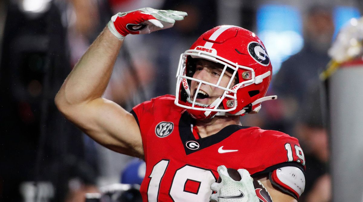 Georgia tight end Brock Bowers (19) celebrates after scoring a touchdown during the second half of a NCAA college football game against Ole Miss.