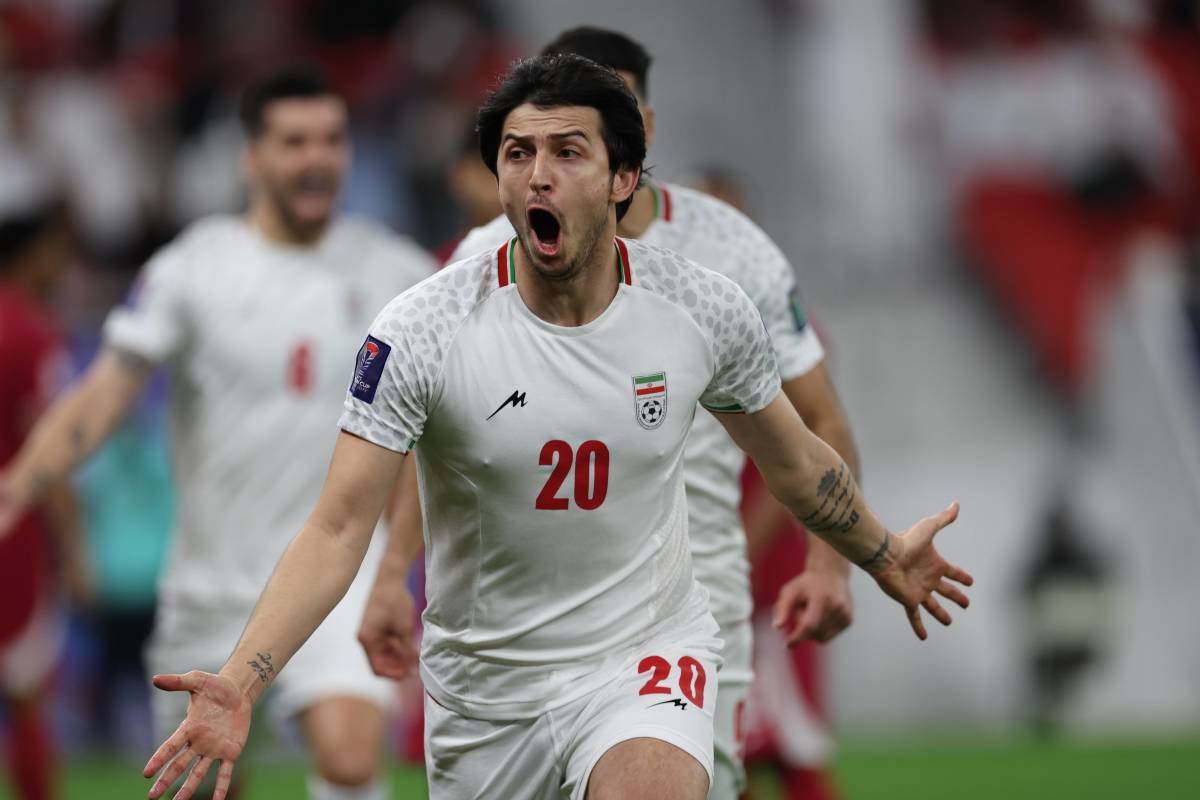 Sardar Azmoun pictured celebrating after scoring for Iran against Qatar in the semi-finals of the 2023 AFC Asian Cup