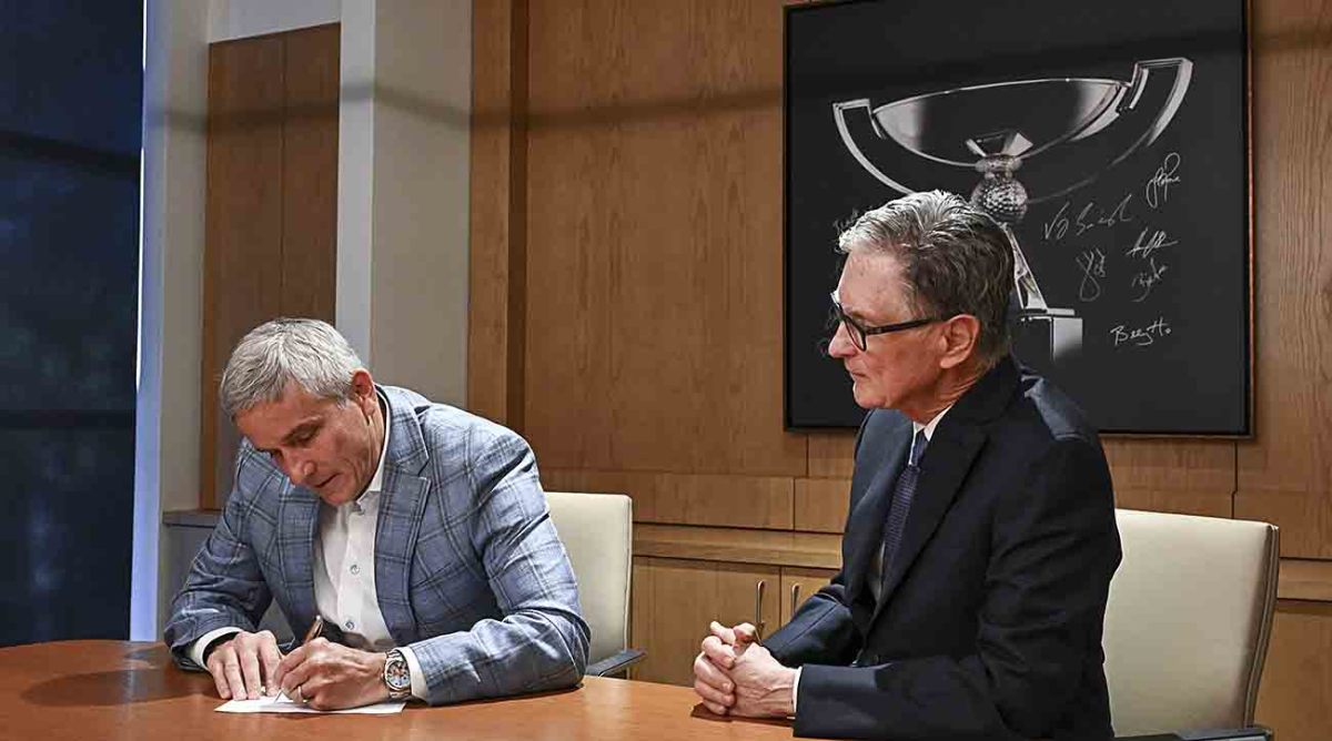 PGA Tour commissioner Jay Monahan and John Henry of Fenway Sports Group sign an agreement announcing the launch of PGA Tour Enterprises in partnership with Strategic Sports Group (SSG) on Jan. 31, 2024, in Ponte Vedra Beach, Fla.