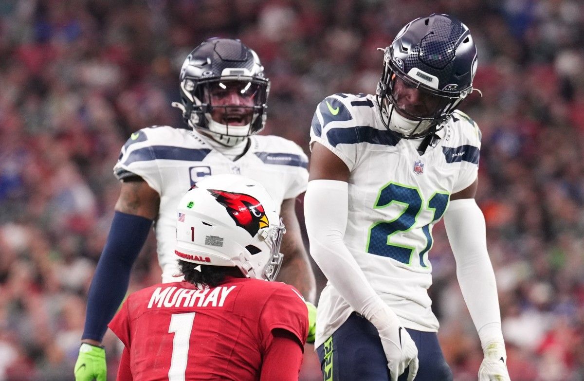 Seattle Seahawks cornerback Devon Witherspoon (21) taunts Arizona Cardinals quarterback Kyler Murray (1) during the second half at State Farm Stadium.