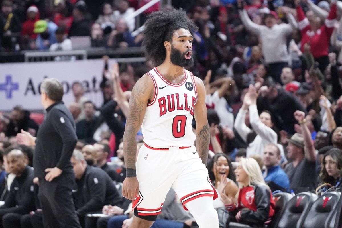 Chicago Bulls guard Coby White (0) reacts after making a three-point basket against the Minnesota Timberwolves during the second half at United Center. Mandatory