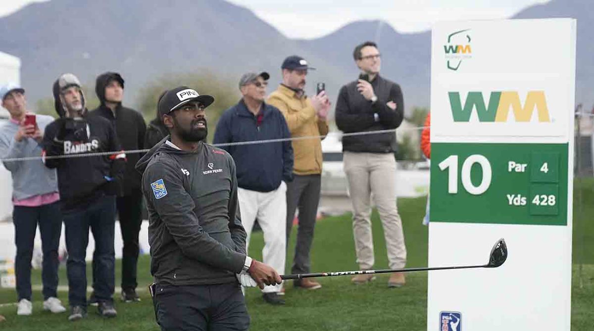 Sahith Theegala watches his ball from the 10th tee box during Round 1 of the WM Phoenix Open at TPC Scottsdale on Feb. 8, 2024.
