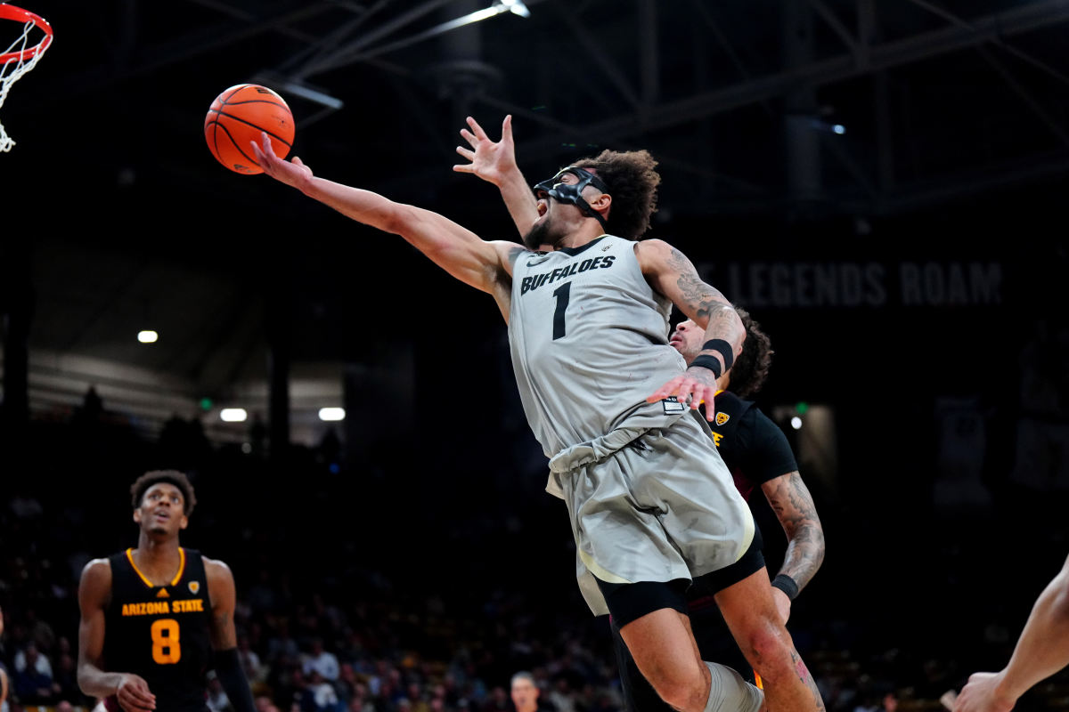 Feb 8, 2024; Boulder, Colorado, USA; Colorado Buffaloes guard J'Vonne Hadley (1) shoots the ball in the second half \V| at the CU Events Center.
