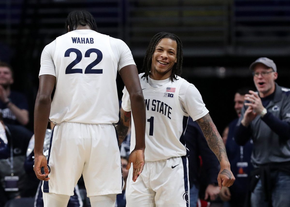 Penn State guard Ace Baldwin Jr. celebrates with Qudus Wahab during the Nittany Lions' Big Ten victory over Iowa at the Bryce Jordan Center.