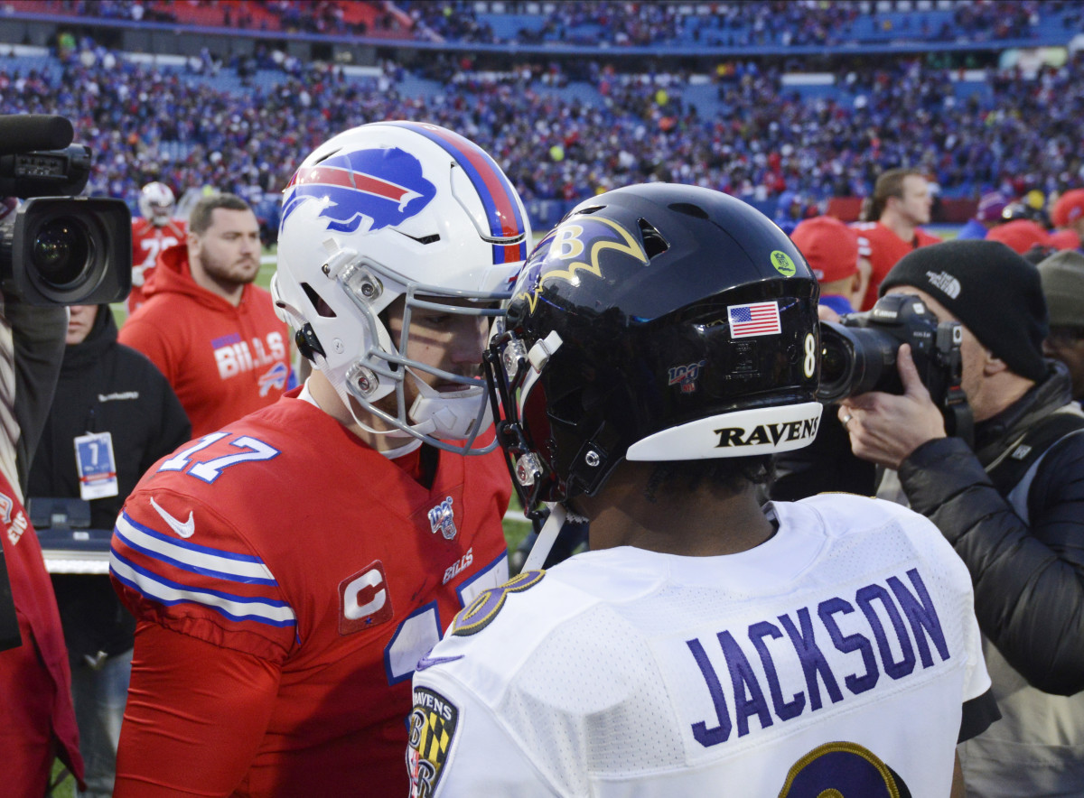 Buffalo Bills quarterback Josh Allen (17) meets Baltimore Ravens quarterback Lamar Jackson (8) at mid-field after a game at New Era Field.